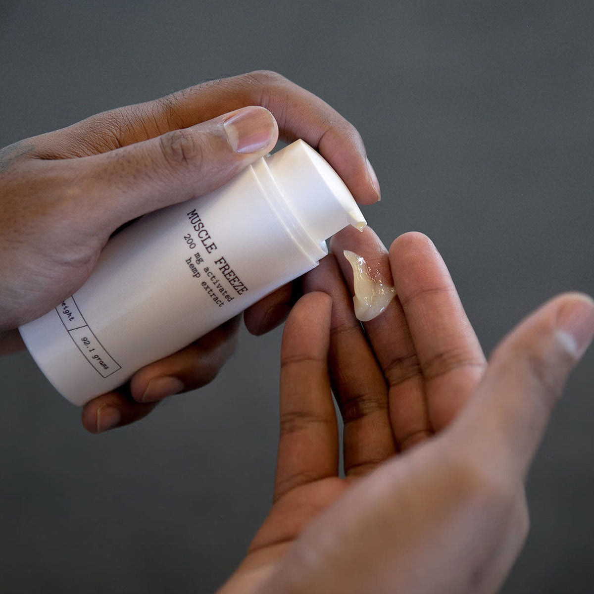 person applying Mary's Nutritionals muscle freeze to hand