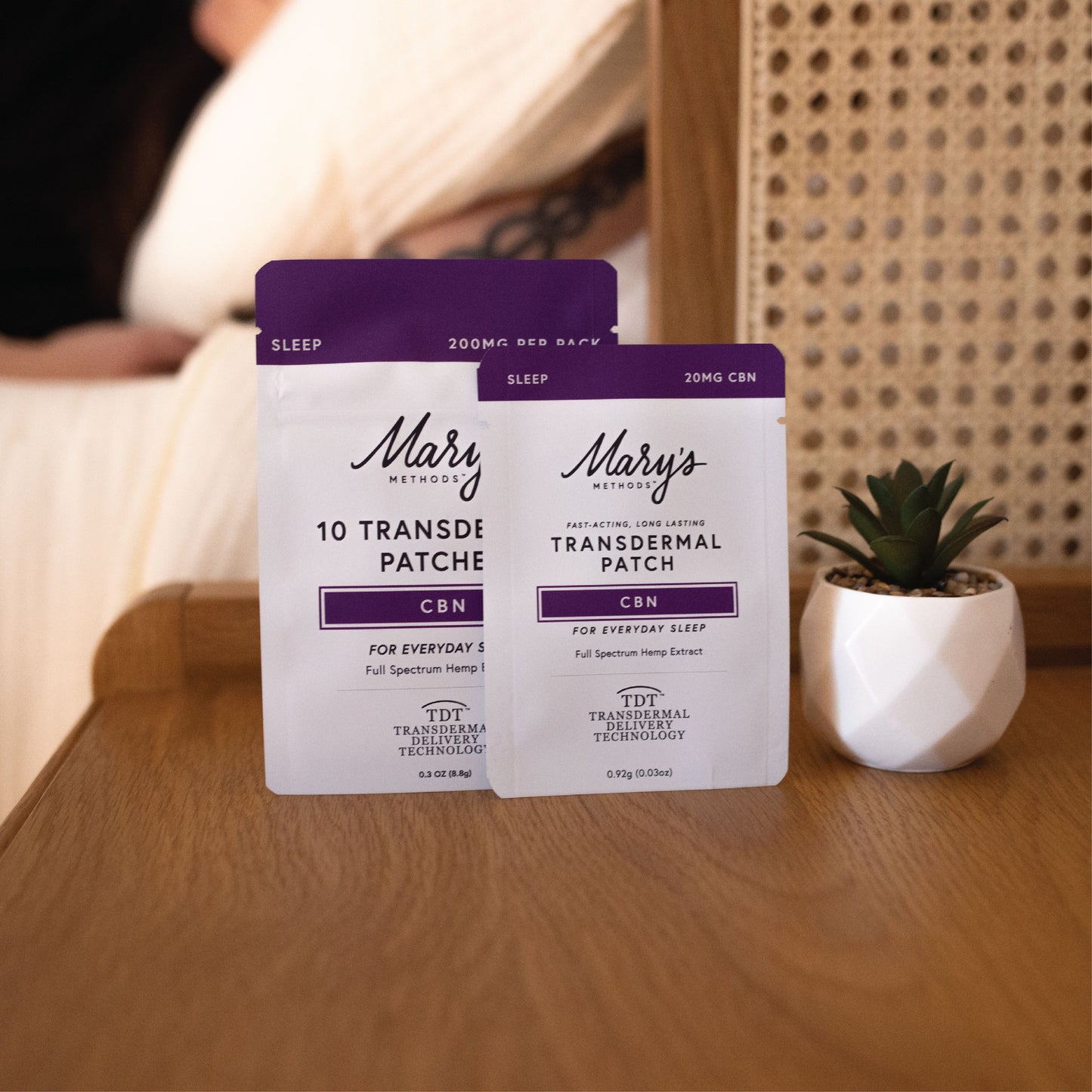 woman sleeping in bed with Mary's Methods Sleep CBN Transdermal Patches