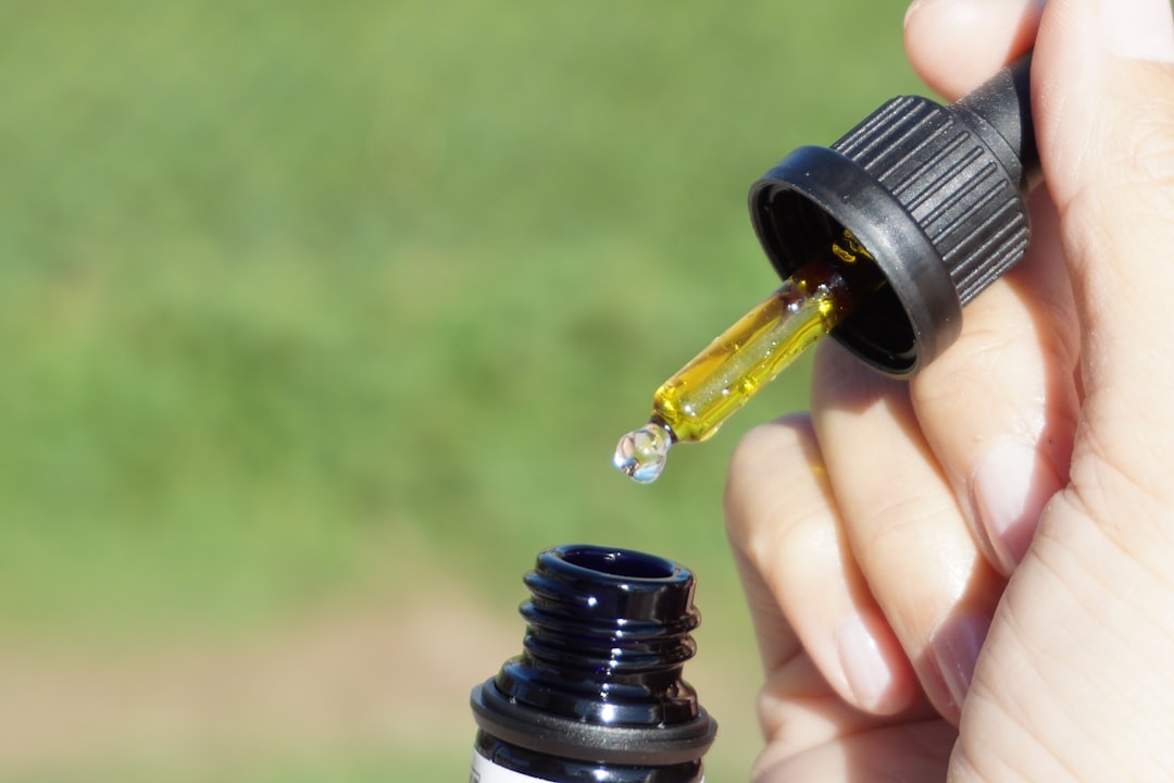 tincture full dropping into the bottle