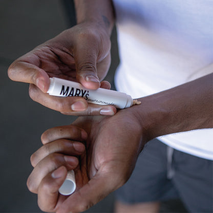 Man applying Mary's Nutritionals Transdermal CBD Gel Pen